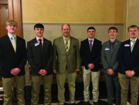 Stafford County 4-H club members (from left) Braxton Alpers, Cody Newdigger, state representative Brett Fairchild, Weston Peterson, Garrett Dunn, and Easton Alpers